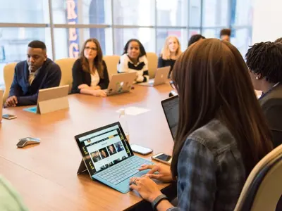 Group Of People at work Sitting at Table