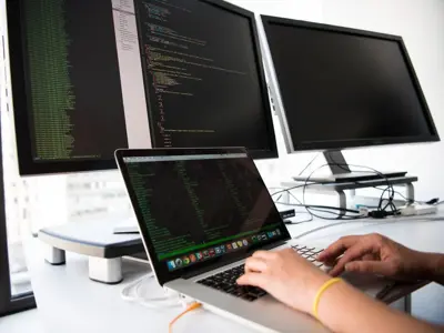 Working at desk multiple screens